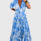 Minelda – Vestido florido com decote em V